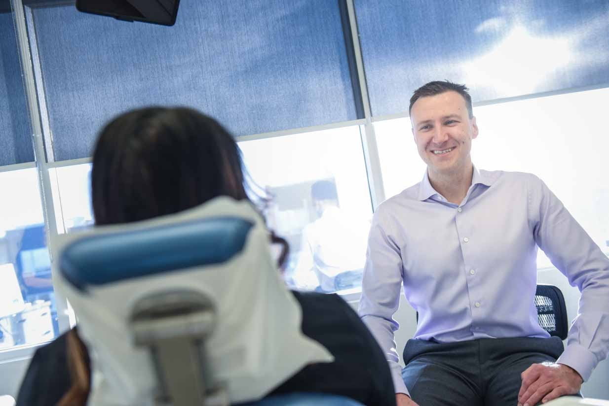 Dr. Tom Chatting with Patient | West Calgary Periodontics